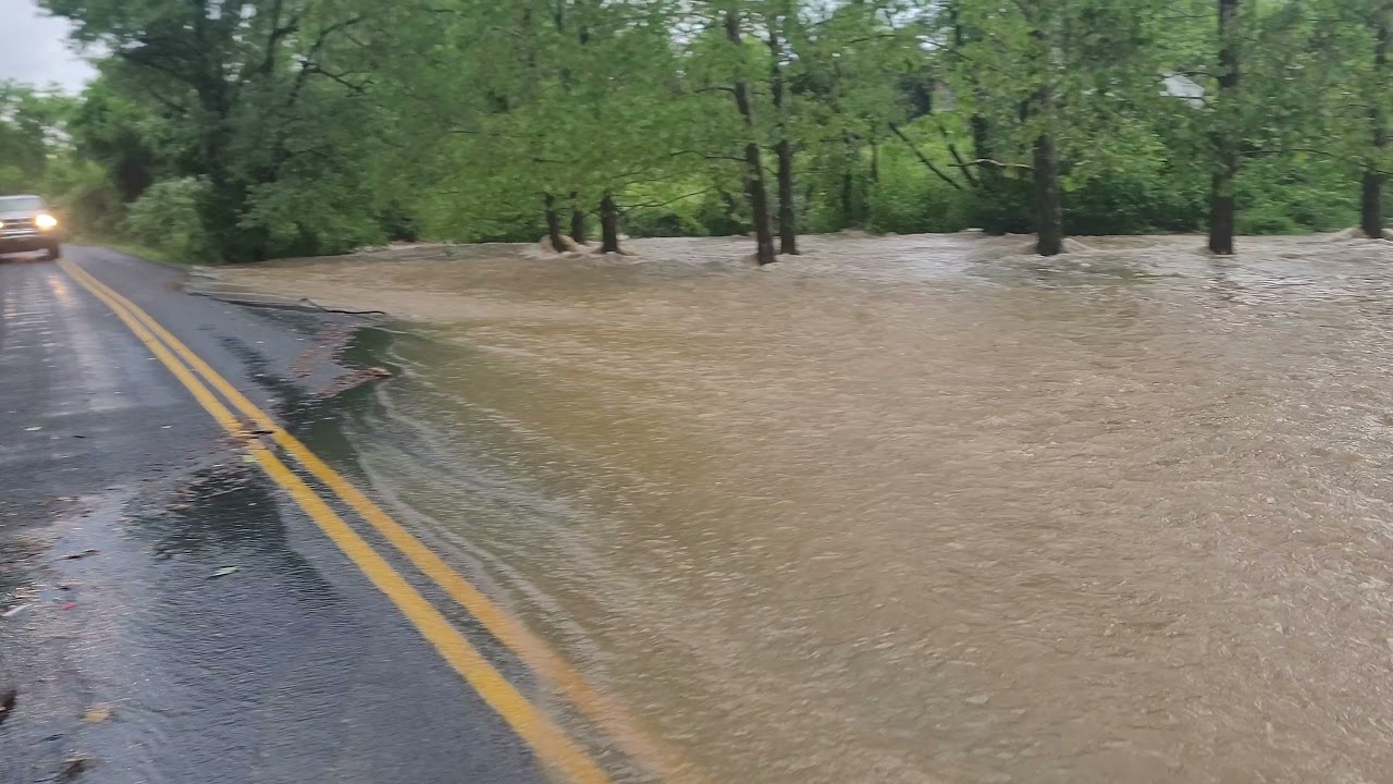 flash flooding, car swept away