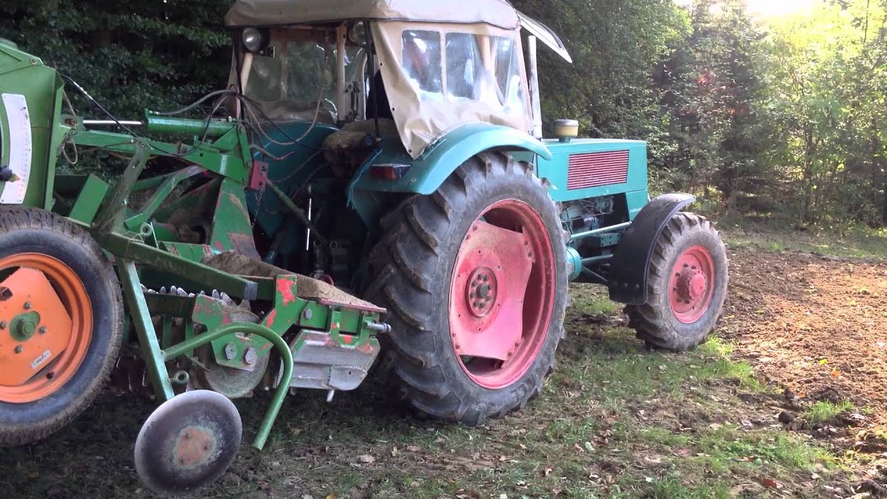 Hanomag Robust 901 Allrad mit Kreiselegge und Amazone D8-25 Super