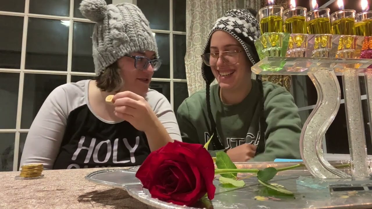 Ritchel and Rivchu play dreidel and celebrate Chanukah while being sick with a cold.