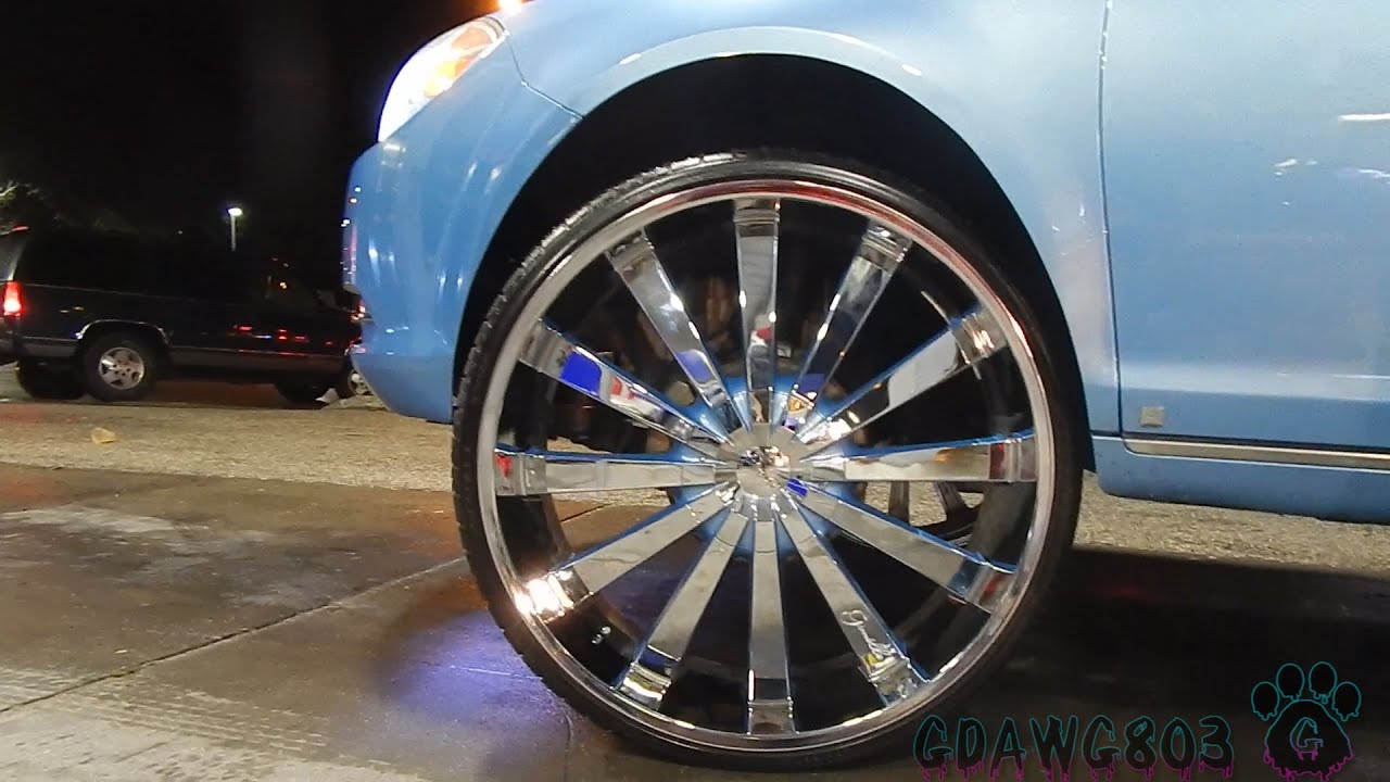 Chevy Malibu on 28s and Buick Lacrosse on 24