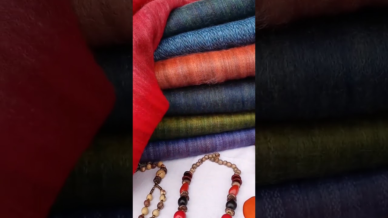 Alpaca shawls, Tagua nut jewelry and  gorgeous scarves all handmade by talented artisans of Ecuador