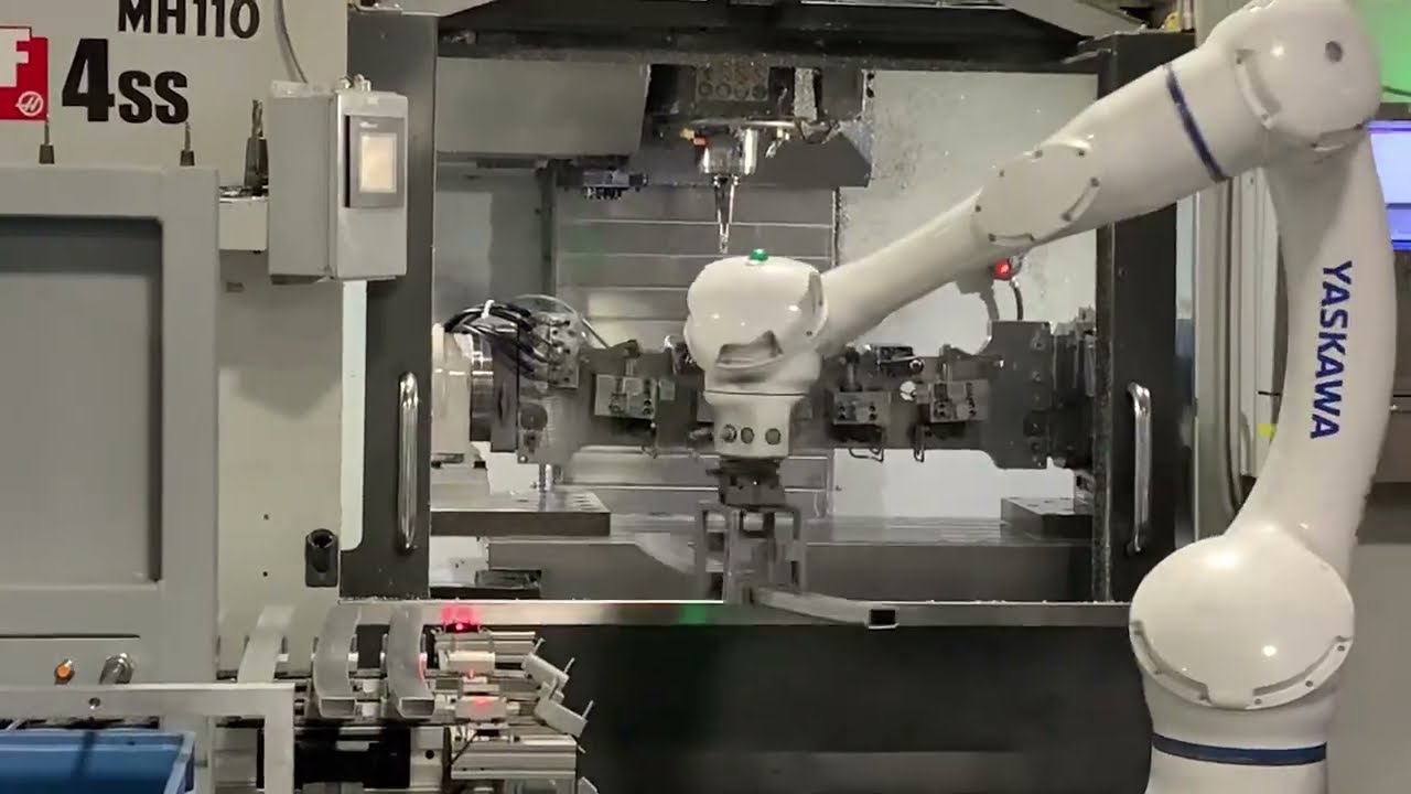 Collaborative robot machine tending, deburring, grinding, re-grip, marking.  @yaskawa Motoman HC20