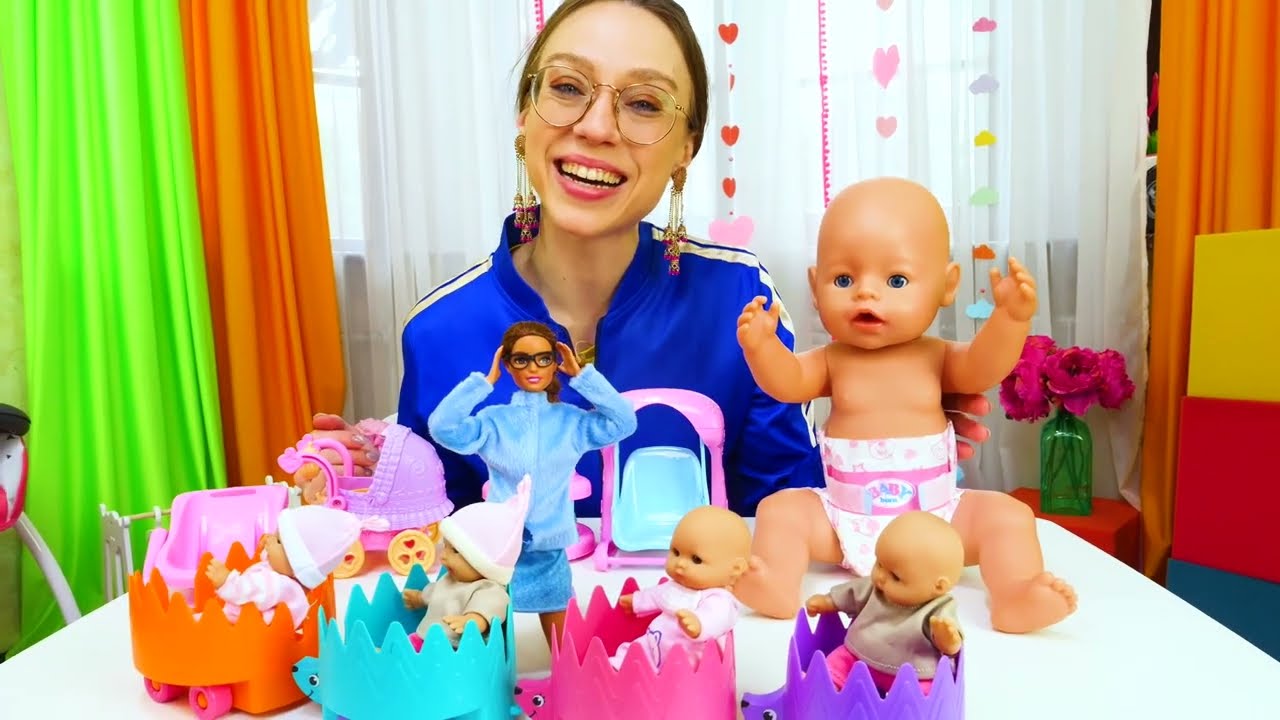 Vauvojen video Annabell-vauvanukesta. J&auml;rjestell&auml;&auml;n nukenvaatteet k&auml;vely&auml; varten. Lasten leikkej&auml;