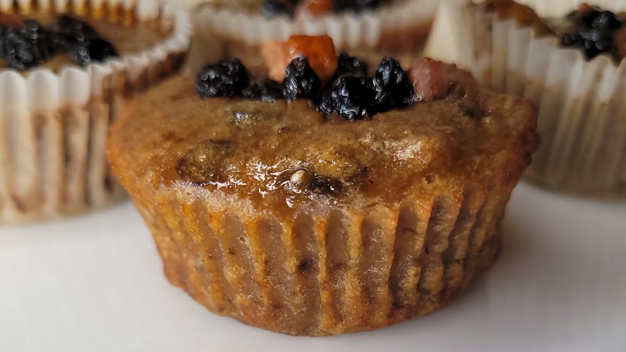 BANANA BREAD MUFFINS WITH RUM INFUSED FRUITS + CHIA SEEDS.