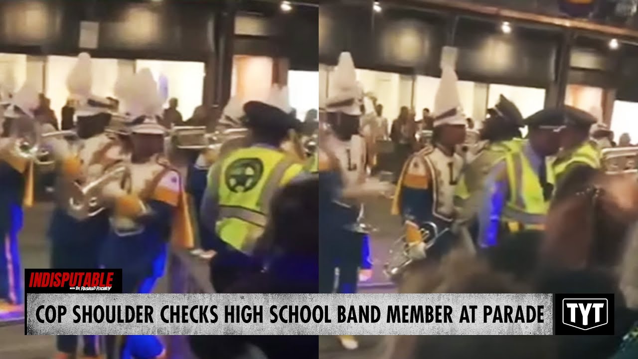 WATCH: Cop Forcefully Shoves High School Band Member For Playing Near Him