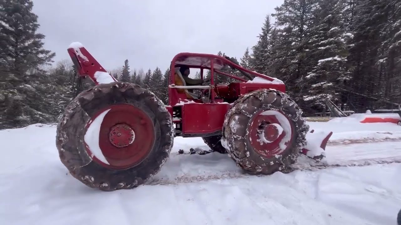 Plowing snow with 230 Timberjack skidder