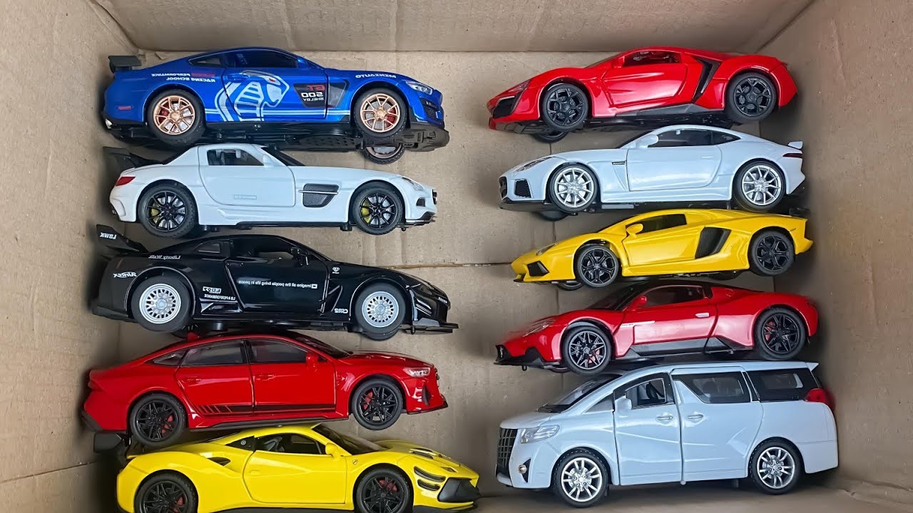 Box Full Of Diecast Model Cars - Camry, Supra, Civic, Land Cruiser, Lada, Tesla