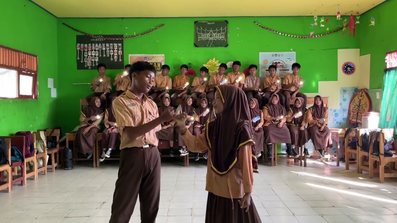 Rizki Fadillah & Riska Amalia 9A 205-2026