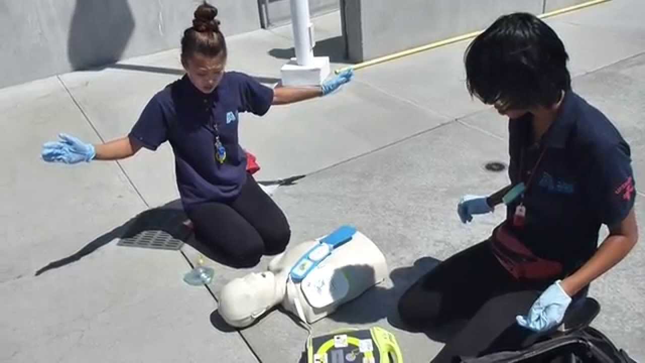 Lifeguarding Drill: 2-Rescuer CPR/AED Prog (Rescuer returns) CPR first