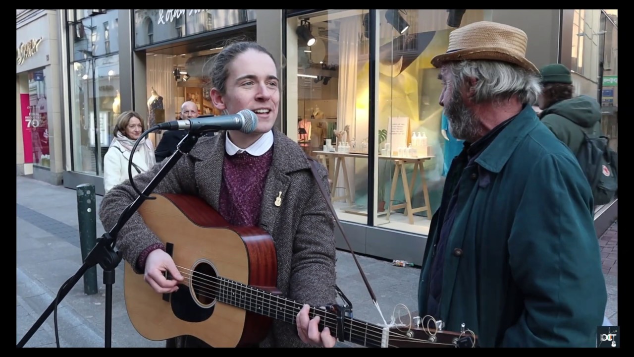 2 generations of Buskers singing 