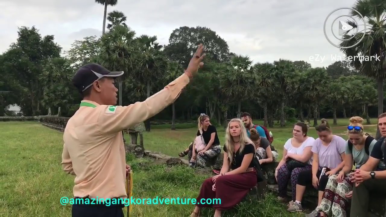 Local guide explain about Angkor Temple