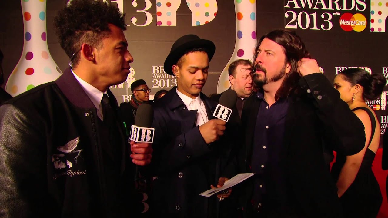 On the Red Carpet: Rizzle Kicks talk to Dave Grohl | BRITs 2013