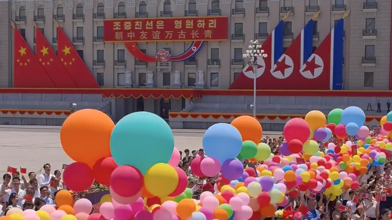 Xi attends welcome ceremony held by Kim Jong Un