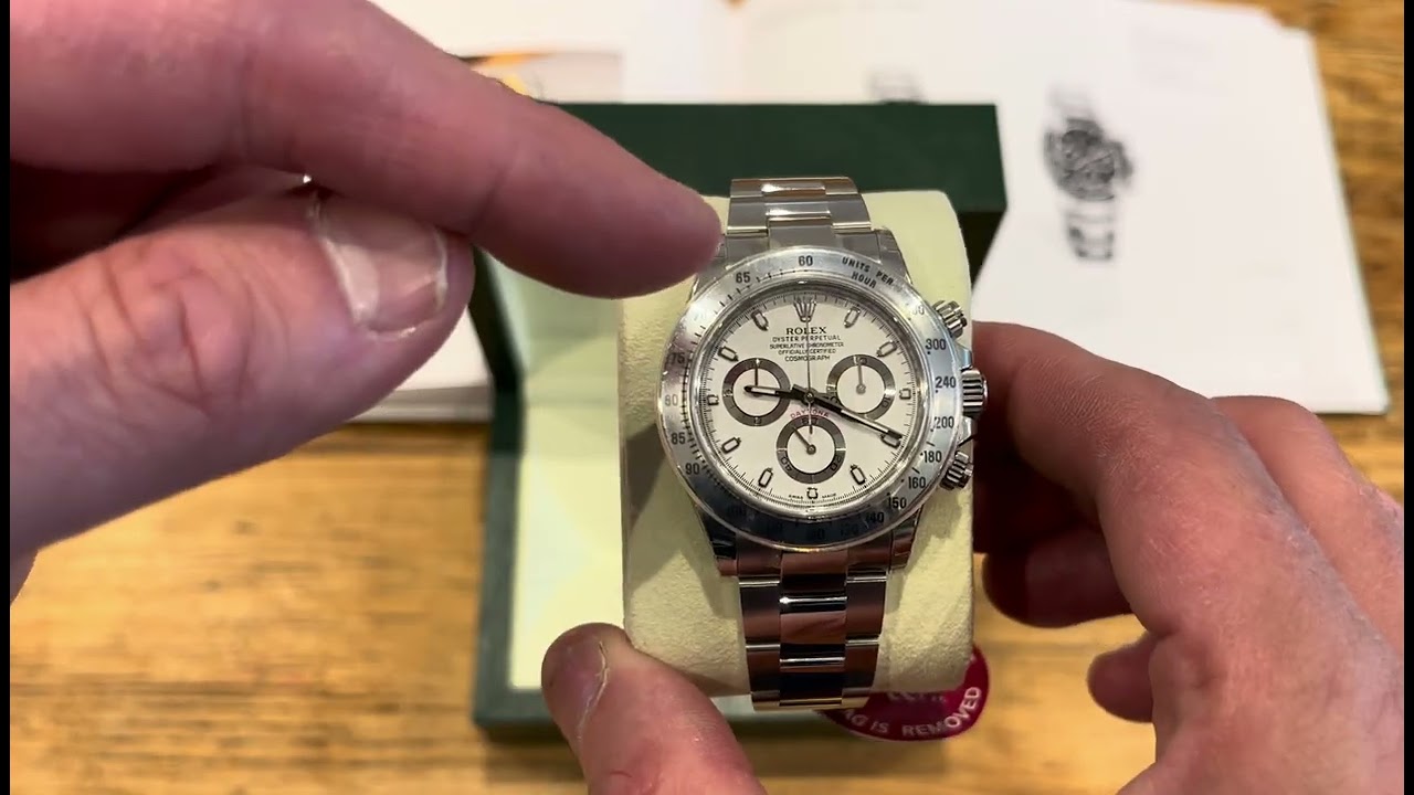 A STICKERED 116520 ROLEX DAYTONA