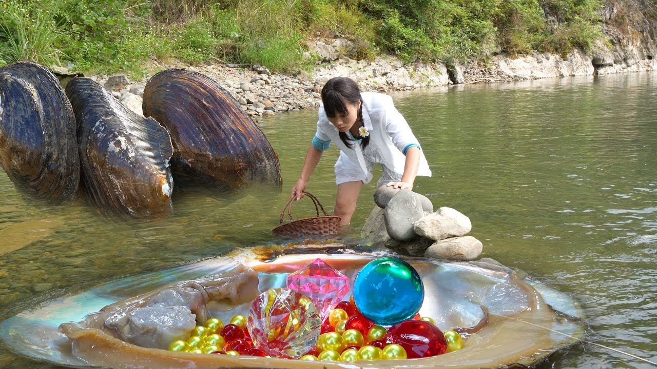 Delving into the River's Secrets,a Girl Finds Mutant Clams Loaded with Colorful Gemstones and Jewels