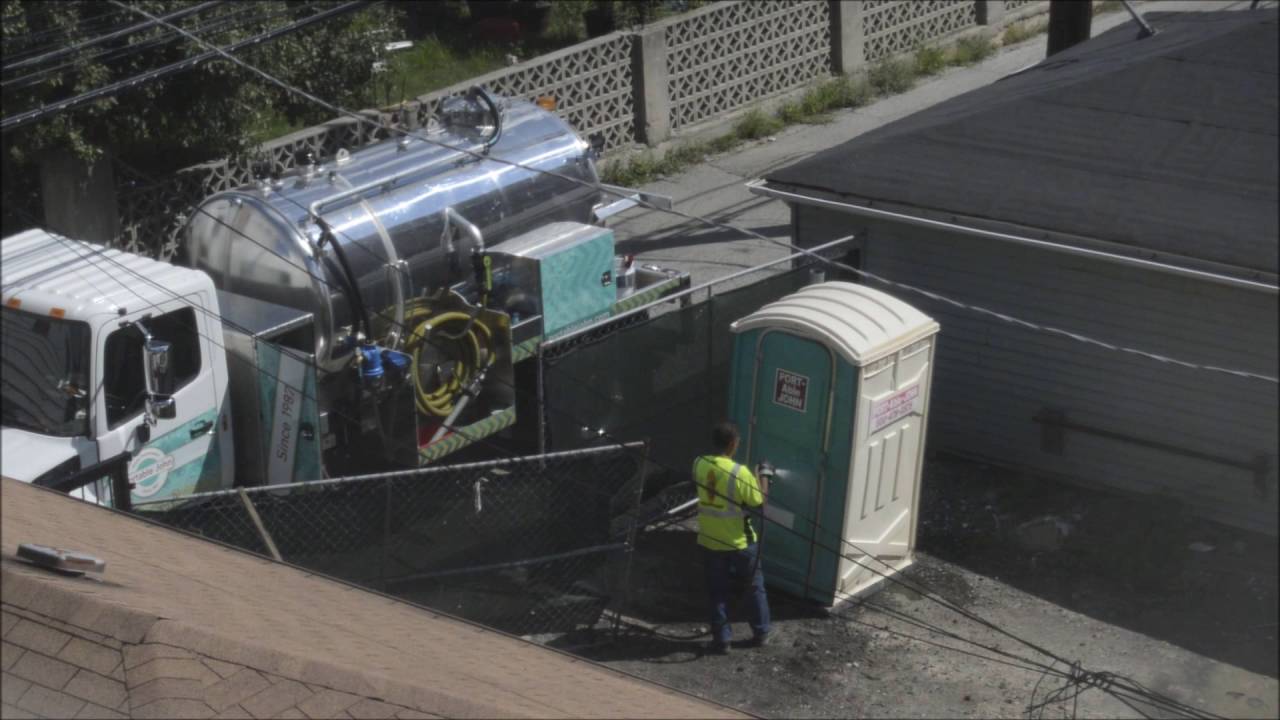 Cleaning out the Porta Potty