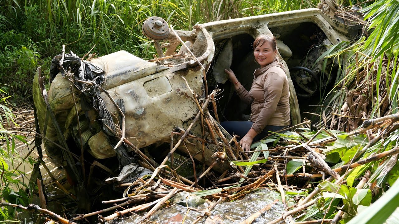 The girl rescues, repairs and restores an abandoned scrap car.