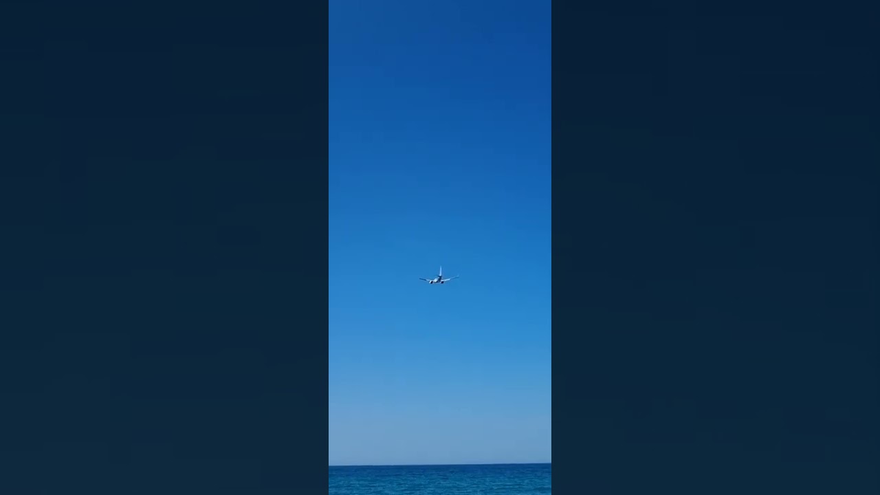 Skiathos Airport over beach take off. August 2022 Tui Boeing 737.