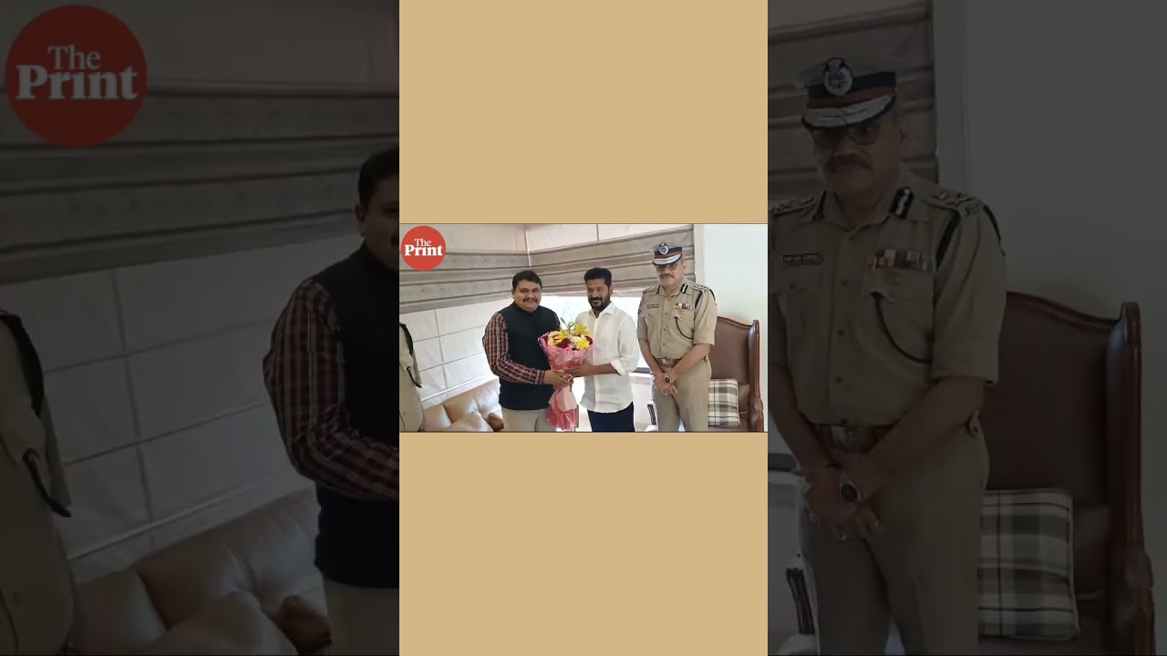Telangana DGP Anjani Kumar along with other Police officials meet Revanth Reddy at his residence