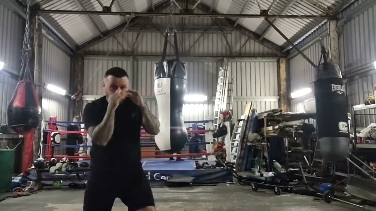 Shadow boxing warm up with bare knuckle to warm the joints up.