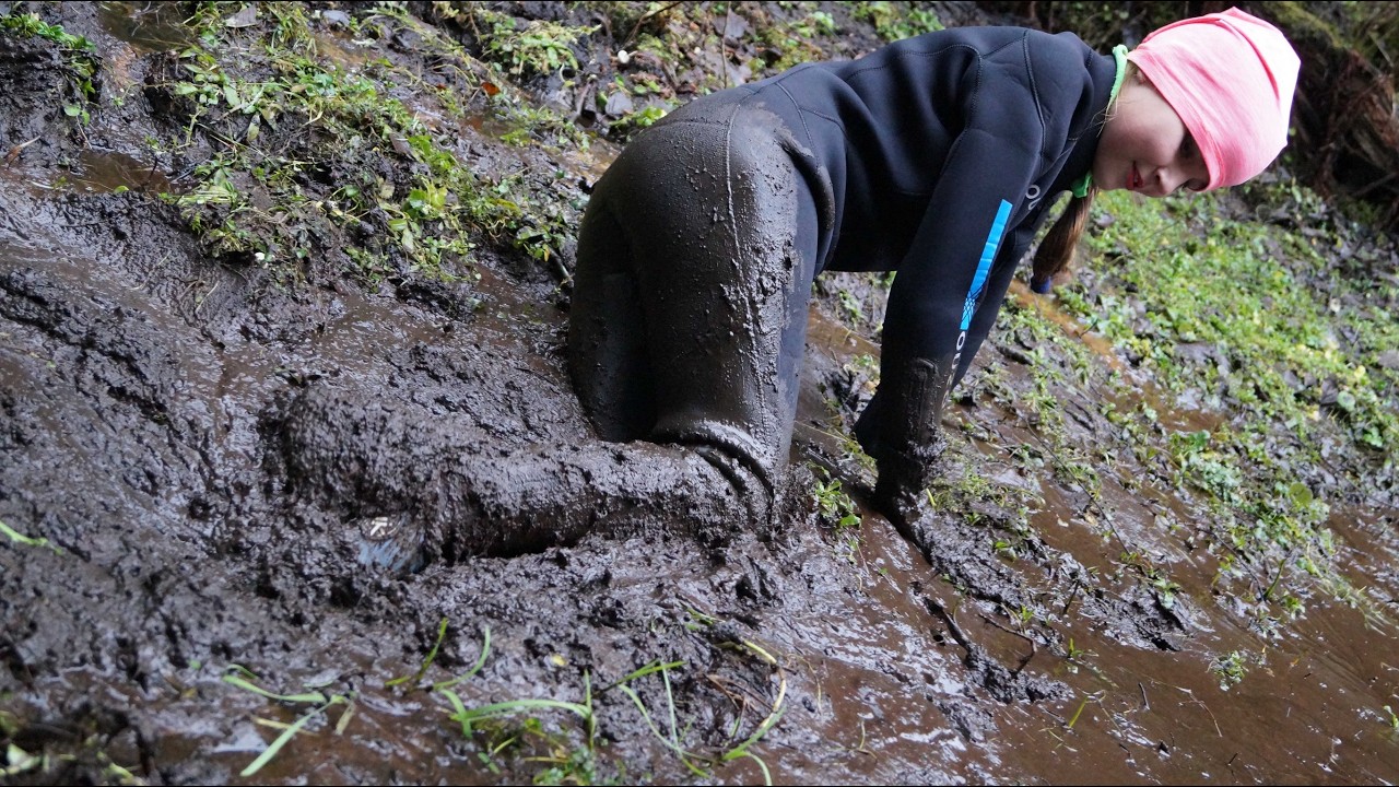 Adventure in wetsuit and super short wellies