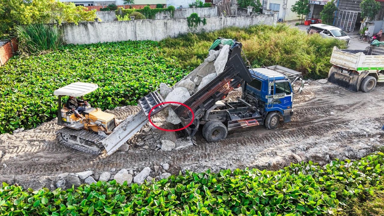 Nicely Completed Project Landfilling By Smart driver 5TTrucks unloading Rock And Dozer pushing clear