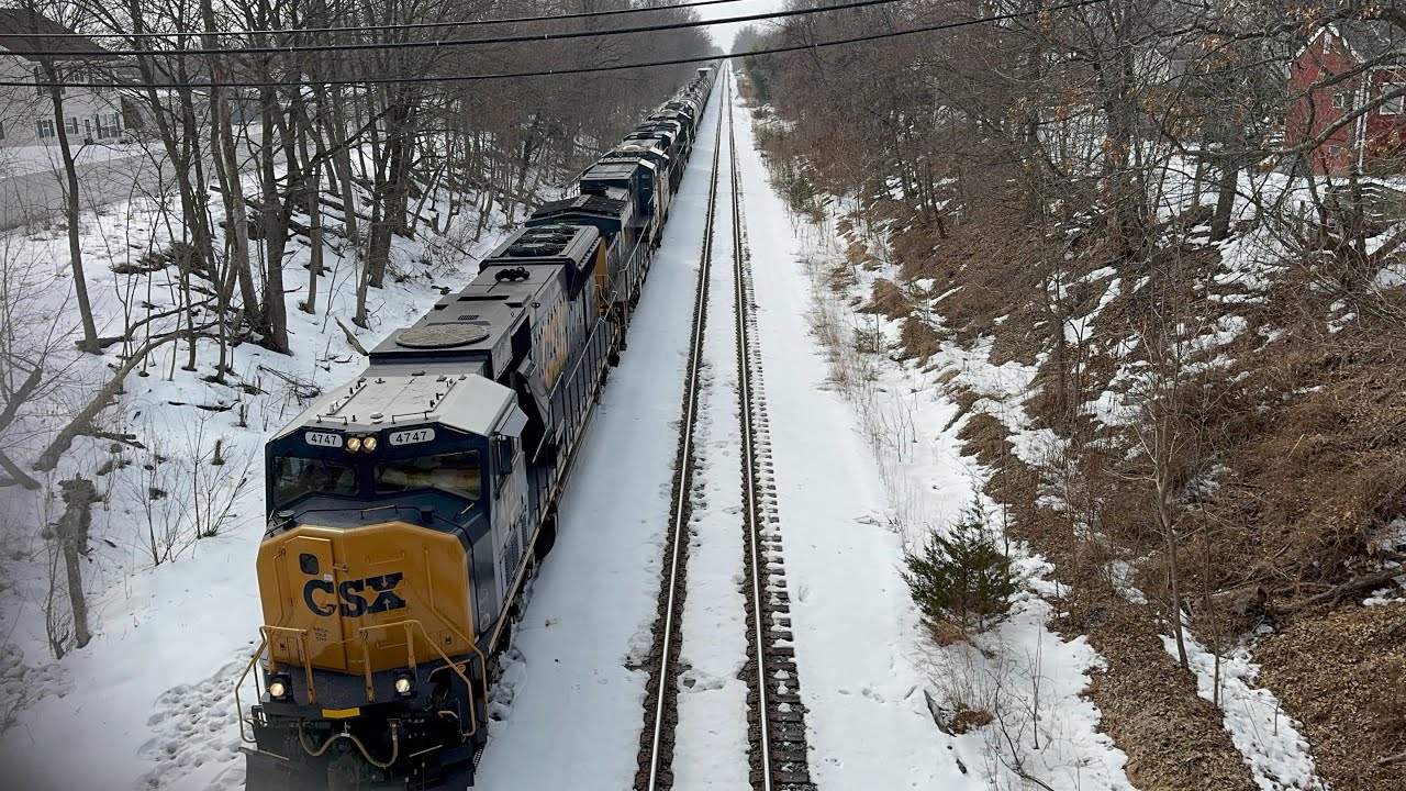 CSX 4747 flared SD70AC leads CSX M404 through Manville NJ 2/17/2026 