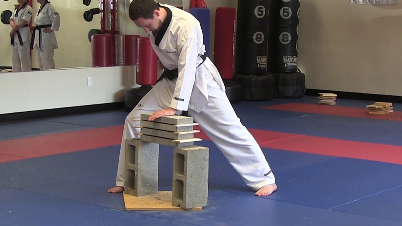 Breaking 4 bricks at 4th degree black belt test