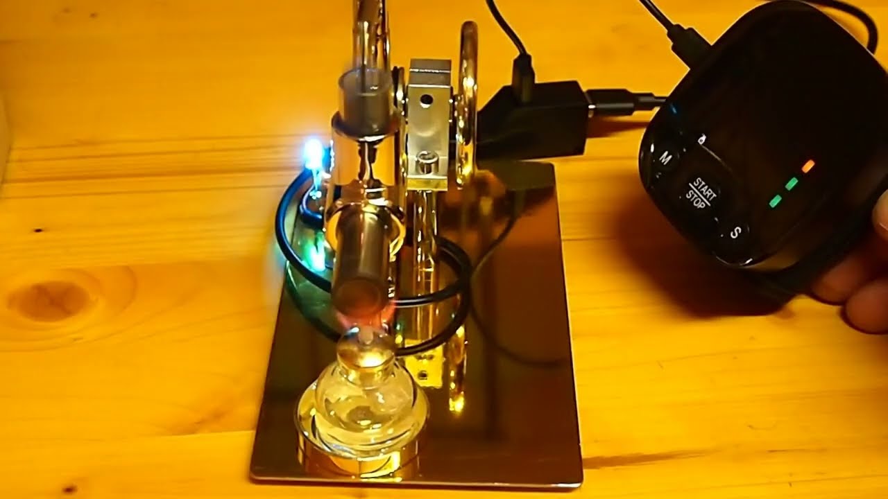 Handy, Smartphone Aufladen mit Stirlingmotor, nicht ganz ernst gemeint, aber funktioniert