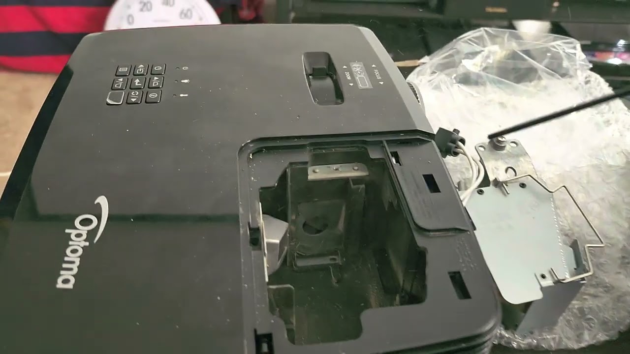 Replacing the bulb in my Optoma HD142X home theater projector after 5003 hours and 5 years.