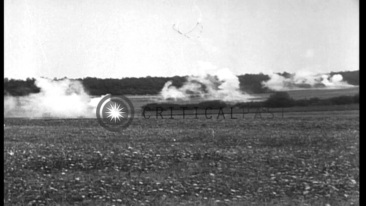 United States 328th Tank Battalion moves across a field in France HD Stock Footage