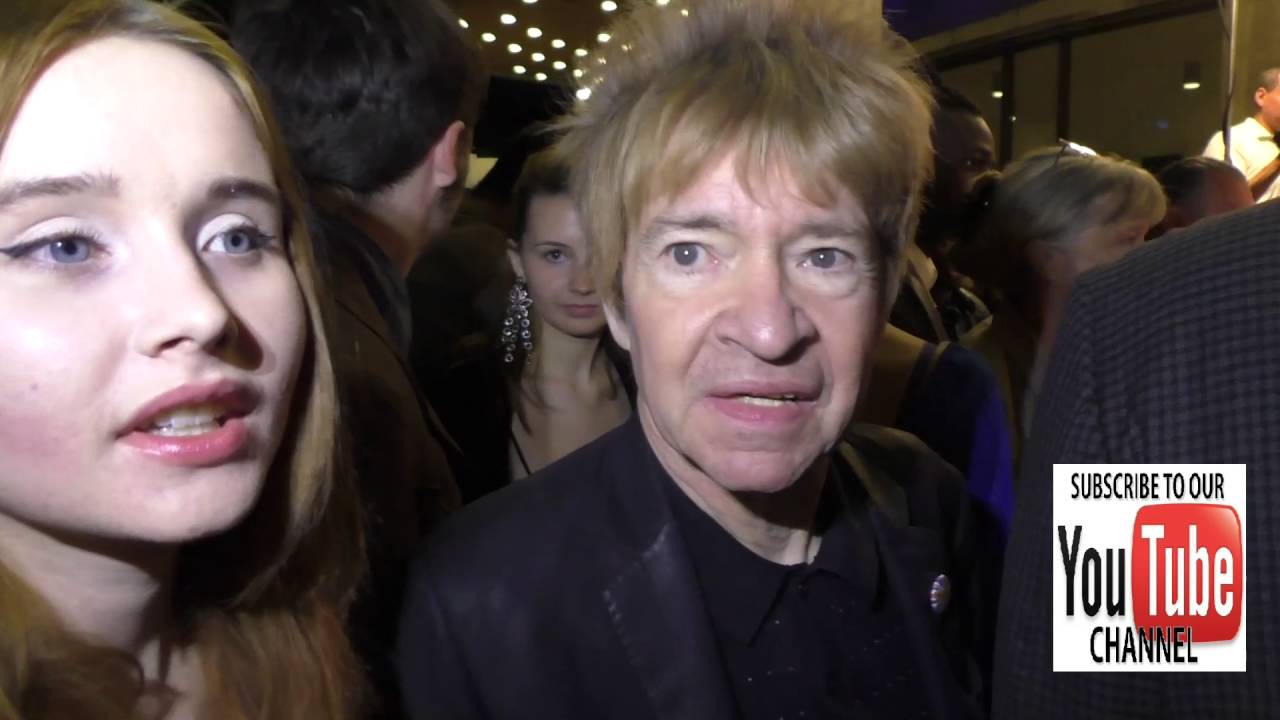Rodney Bingenheimer and Kansas Bowling talks about music outside ArcLight Theatre in Hollywood