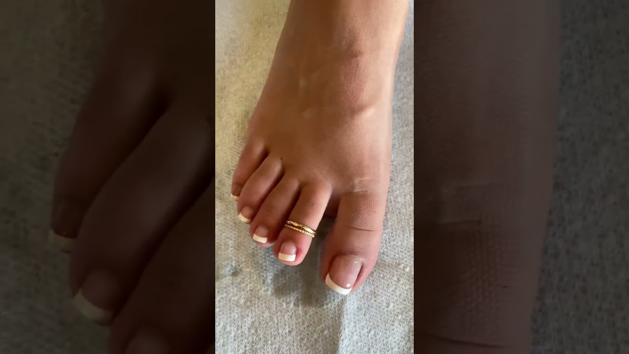 Foot with Gold Toe Rings by Fancy Feet Co.