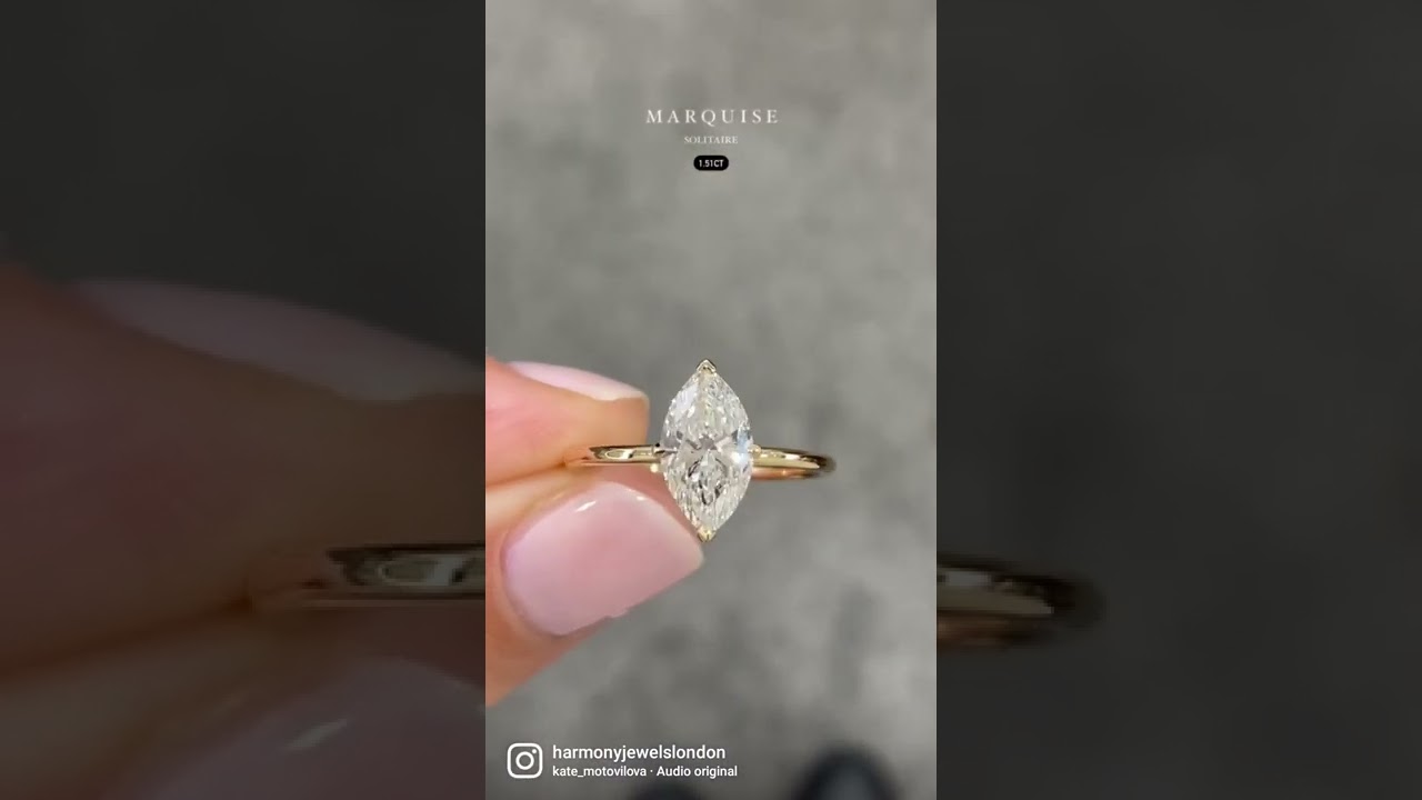 Marquise solitaire engagement ring & matching micro set wedding band