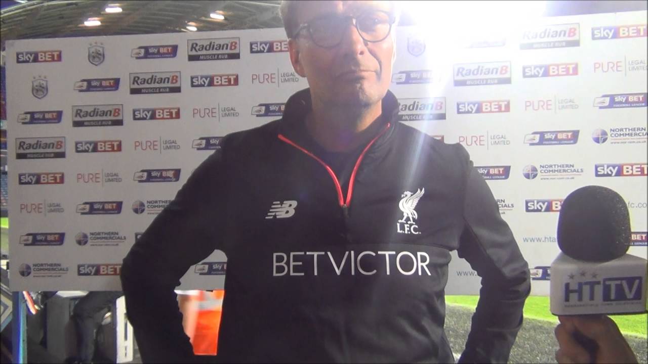 INTERVIEW: J&uuml;rgen Klopp insists he is now a Huddersfield Town fan.