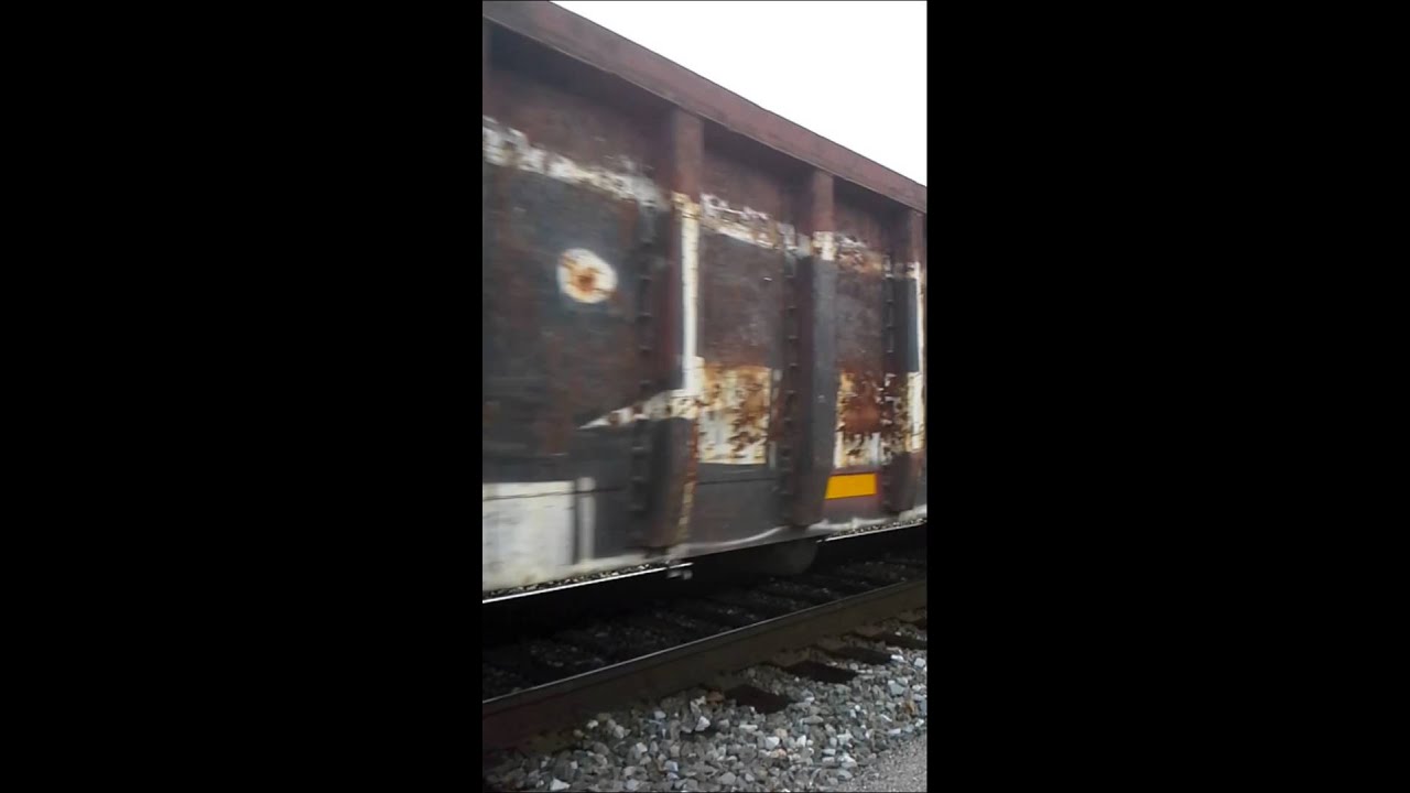 A solo ES44AH on slab train K554