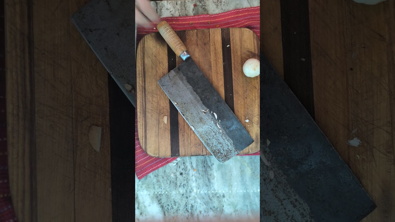 Chopping mushrooms with vintage Chinese chef knife cleaver 