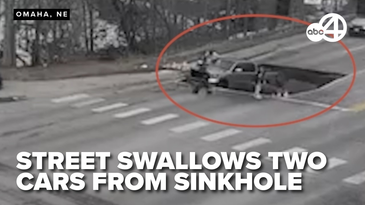 Sudden sinkhole devours two cars in Omaha