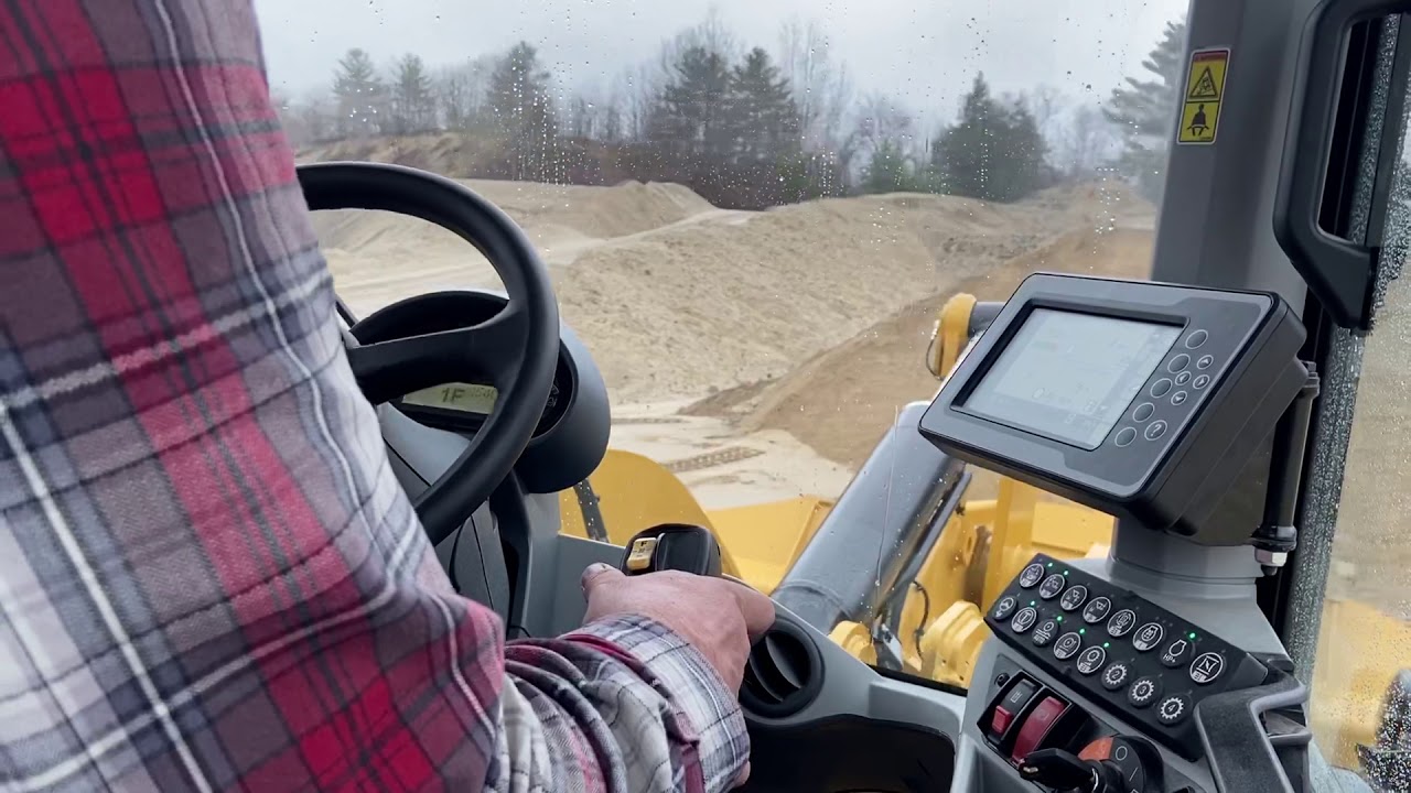 Loading a truck in our new CAT 938M
