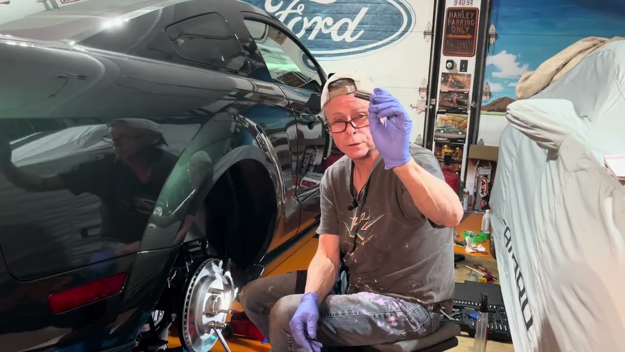 Installing the rotor, caliper bracket, and pads/caliper