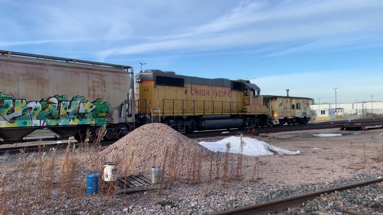 UP 815 doing yard work with Union Pacific Coal train passing by ￼
