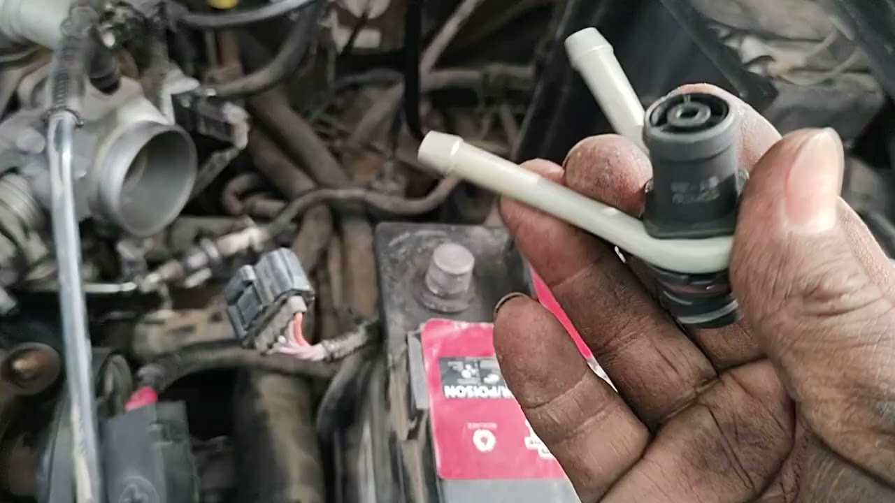 cambiar la válvula pcv de una Ford escape 2002