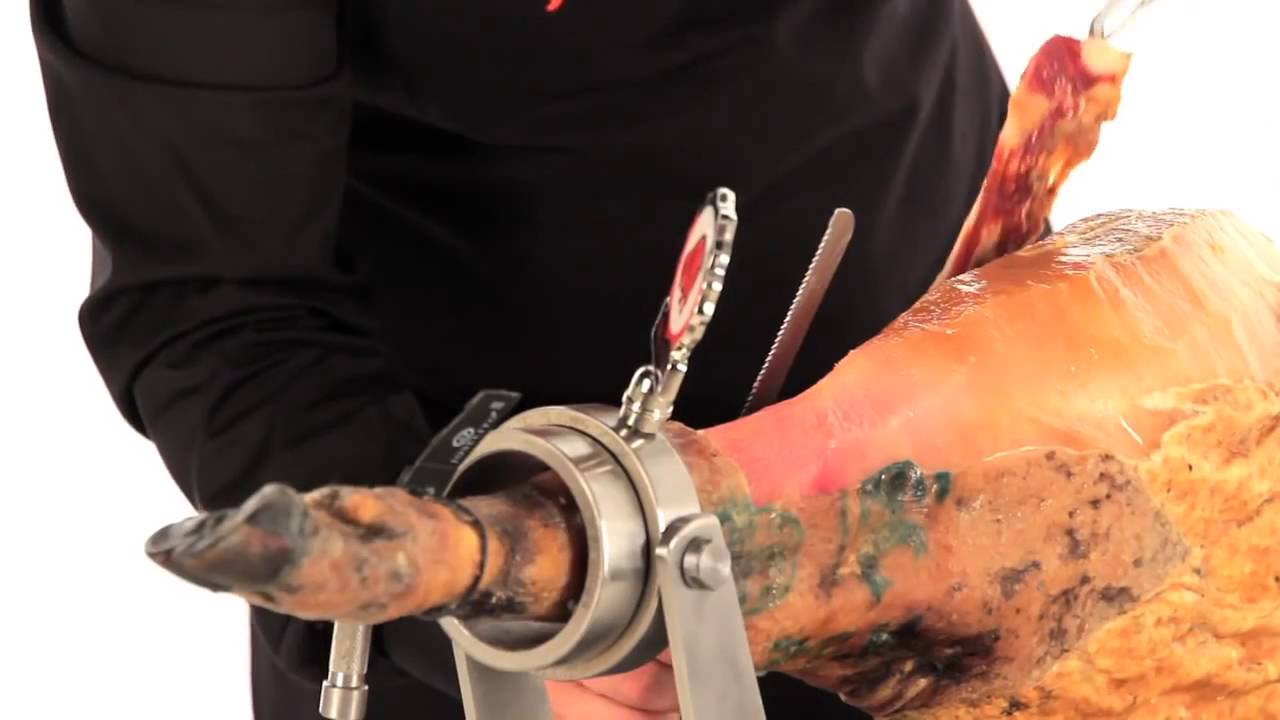 HOW TO CARVE A SPANISH JAMON  Cutting Iberian ham.  How to slice jamon