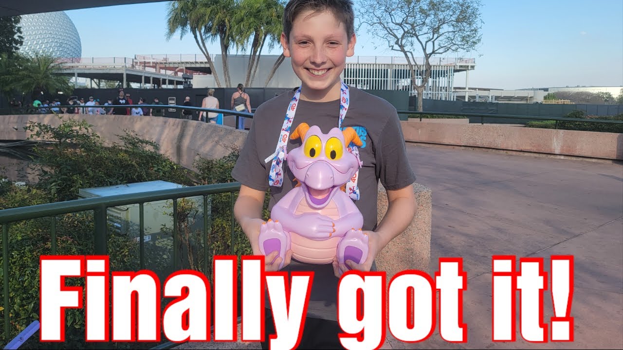 He got his EPCOT Figment popcorn bucket!