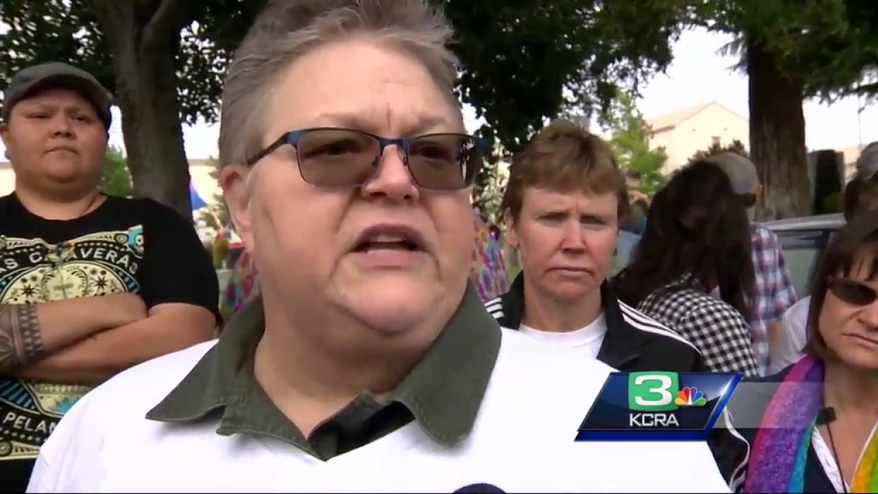 Protesters gather outside church to denounce anti-gay pastor