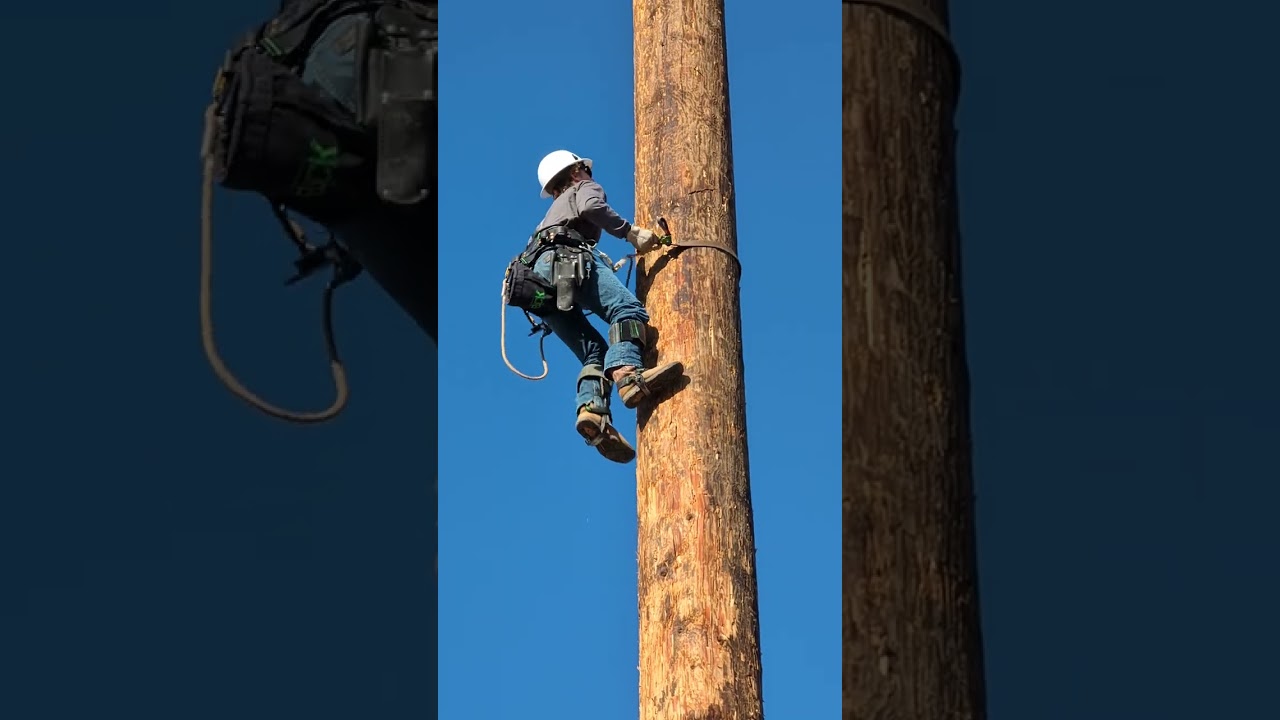Z climbing 110 foot pole at Lazy Q training center