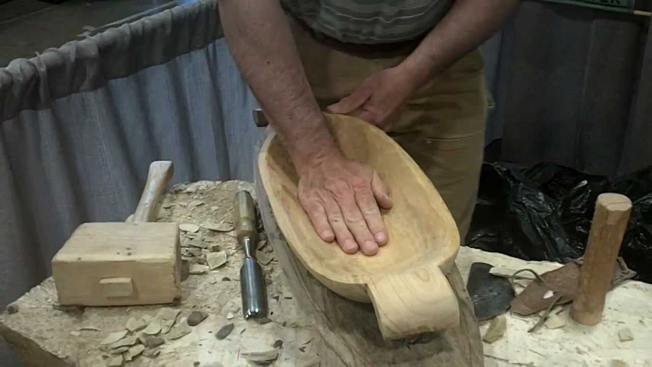 Master carver Norman Brown at the Mother Earth Fair