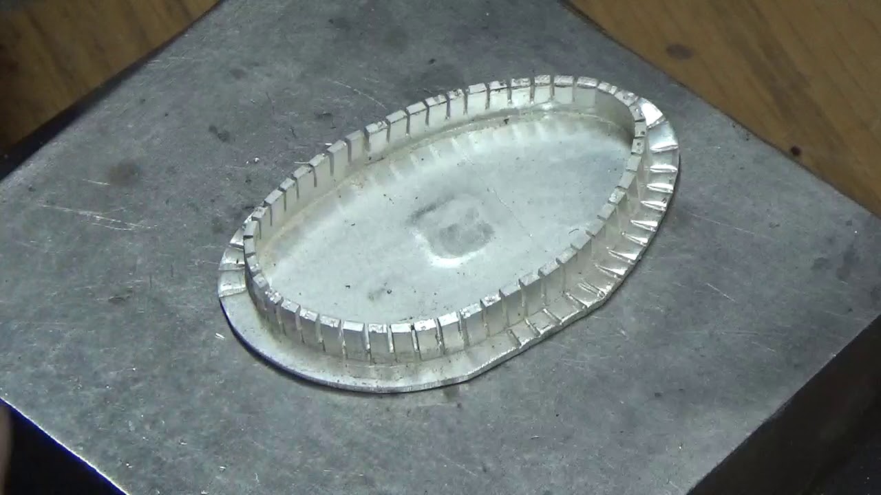 Serrating a backplate