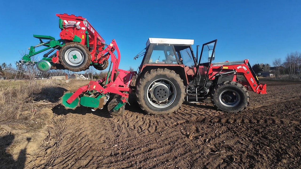 Imponujący Zetor 12145 Sianie owsa zestawem Agro-Masz
