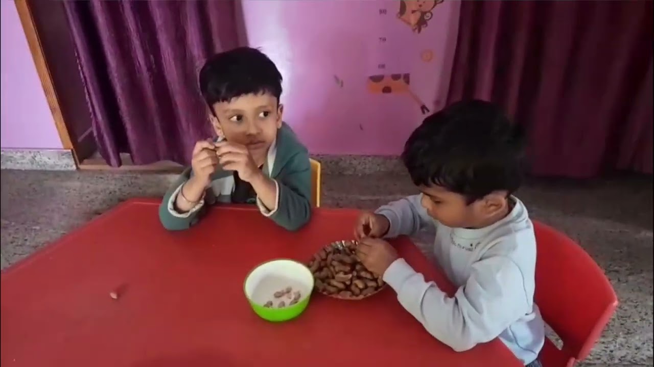 Kid's preparing for Makara Sankranti festival...peeling of Ground nuts.....improves Fine motor skill